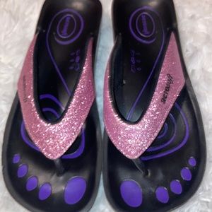 Pink sparkly flip flops